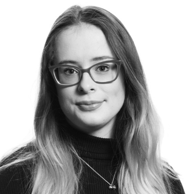 Black and white photo of Heather Lacey with Eversheds Sutherland logo