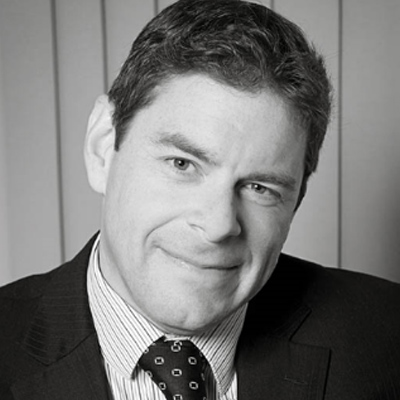 Black and white photo of Nick Goss with the Goss Consultancy logo